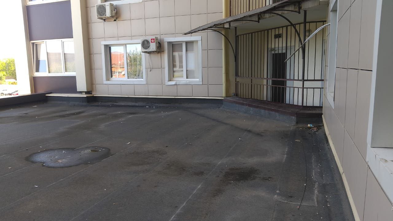 Чистка козырьков на Агрономической 2/5